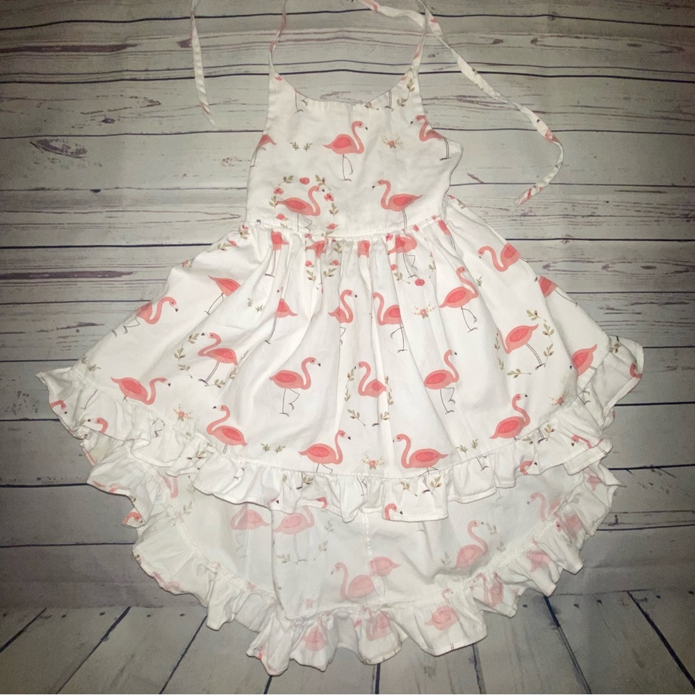 White kids dress with flamingos